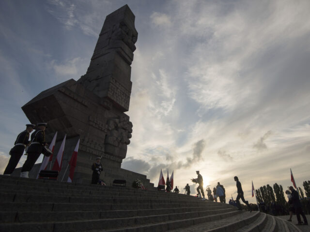 People lay a wreath at the monument to the 1939 heroic defense of the Westerplatte peninsu