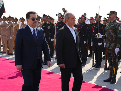 Iranian President Masoud Pezeshkian is welcomed by Iraqi Prime Minister Mohammed Shia al-S