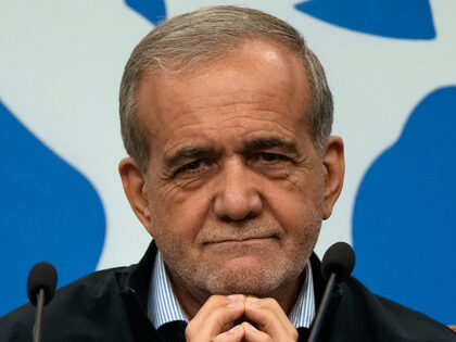 Iranian President Masoud Pezeshkian listens to a question during a press conference in Teh