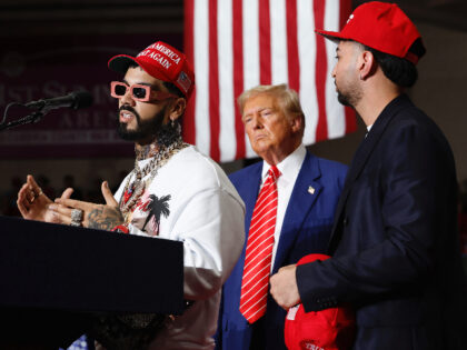 JOHNSTOWN, PENNSYLVANIA - AUGUST 30: Puerto Rican rapper Anuel AA (L) joins Republican pre