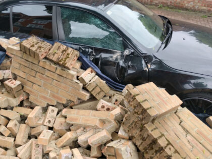 Crushed Car - stock photo