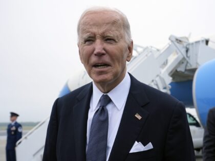 President Joe Biden speaks the the media after stepping off Air Force One at Dover Air For