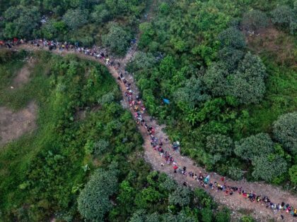 Aerial view showing migrants walking through the jungle near Bajo Chiquito village, the fi