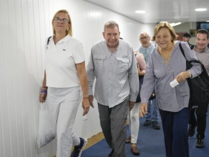 Opposition presidential candidate Edmundo Gonzalez, accompanied by his daughter Mariana, l