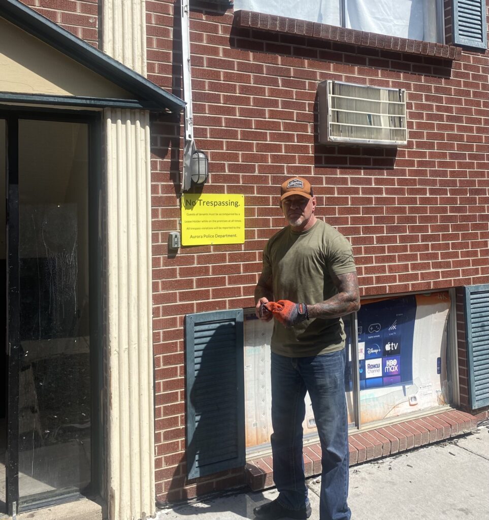 Former ICE Field Office Director John Fabbricatorre stands near a No Trespassing sign ignored by gang members. (Courtesy of John Fabbricatore)