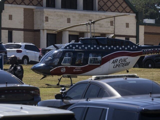 An air evacuation helicopter sits on standby after a shooting took place at Apalachee High