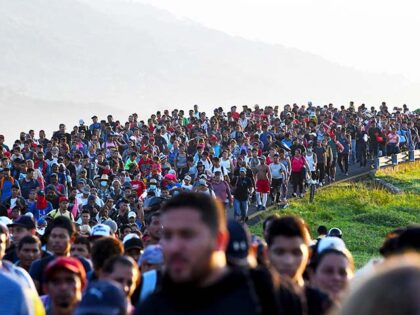 Migrants heading in a caravan to the US, walk towards Mexico City to request asylum and re