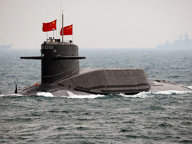 A Chinese Navy submarine attends an international fleet review to celebrate the 60th anniv