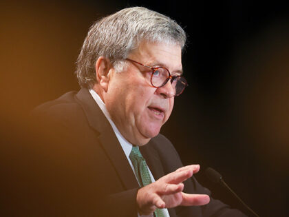 Former U.S. Attorney General William Barr speaks at a meeting of the Federalist Society on