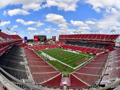 A general view of empty stands as players warm up prior to the game between the Green Bay