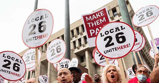 PHOTOS: U.S. Hotel Workers' Strike Threatens Labor Day Travel