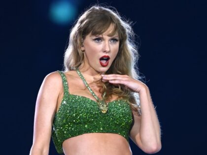 Taylor Swift performs onstage during "Taylor Swift | The Eras Tour" at Wembley Stadium on