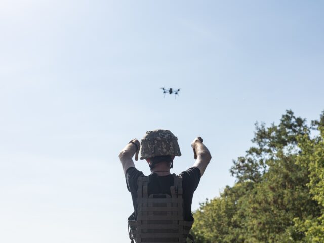 LUHANSK, UKRAINE - AUGUST 25: Ukrainian soldiers prepare FPV drones as military mobility o