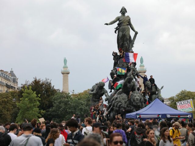 Protesters gather at Place de la Nation to demonstrate against the French President's "for