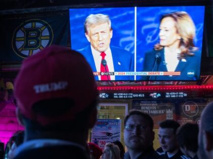 Attendees with D.C. Young Republicans watch the Presidential debate between former Preside