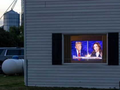 A television showing Democratic presidential nominee, U.S. Vice President Kamala Harris, d