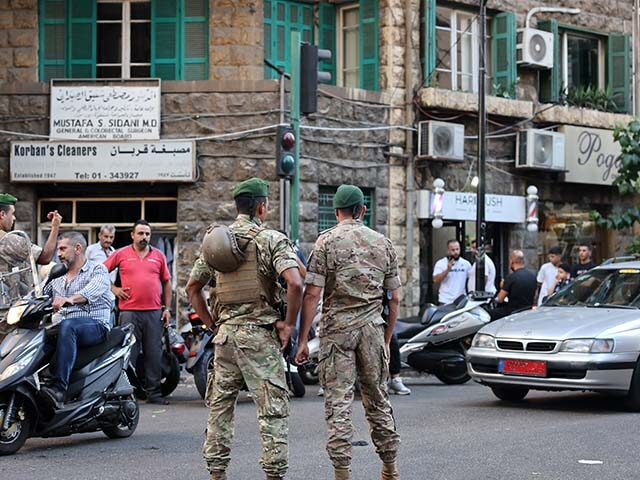 Lebanese army soldiers stand guard near a hospital (not pictured) in Beirut on September 1