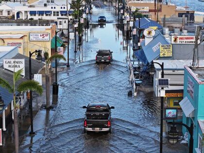 Flood waters inundate the main street after Hurricane Helene passed offshore on September