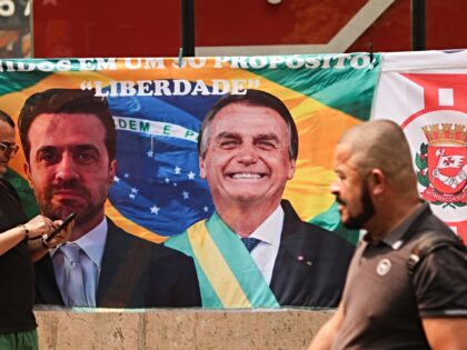 Supporters of former President Jair Bolsonaro (PL) participate in an event on Avenida Paul