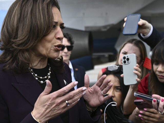 Vice President Kamala Harris speaks to reporters upon arrival at Andrews Air Force Base, M