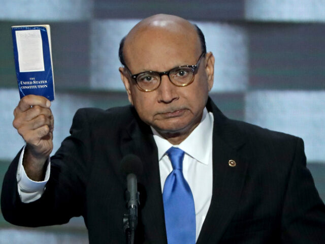 Khizr Khan, father of deceased Muslim U.S. Soldier, holds up a booklet of the US Constitut