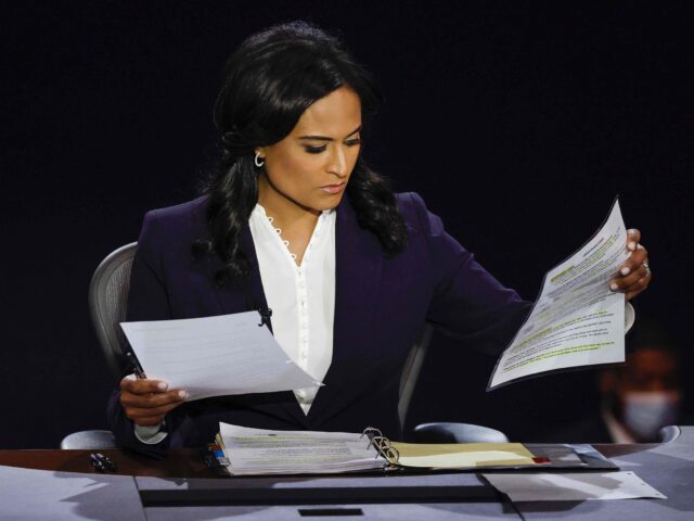 Moderator Kristen Welker of NBC News looks at papers as President Donald Trump and Democra