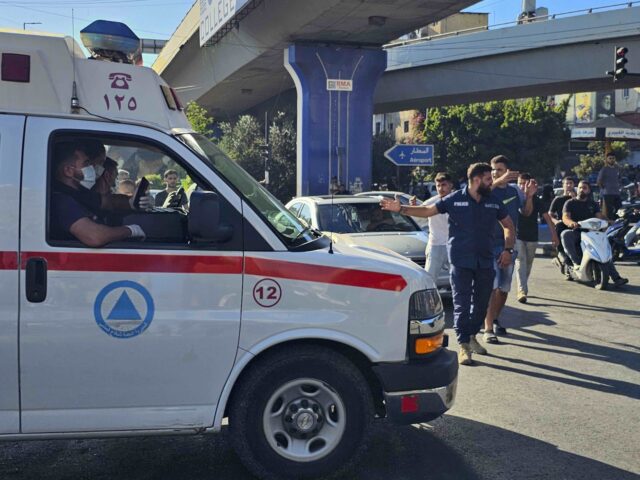 An ambulance carries wounded people whose handheld pager exploded, in Beirut, Lebanon, Tue