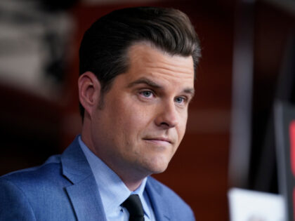 Rep. Matt Gaetz, R-Fla., listens during a news conference at the Capitol in Washington, Tu