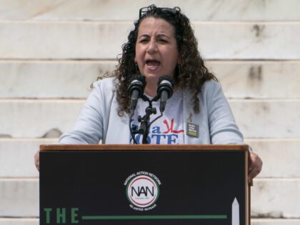 Maya Berry, executive director of the Arab American Institute, speaks during the March on