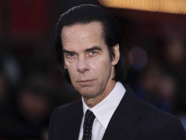 Nick Cave poses for photographers upon arrival at the World premiere of the film 'Bac