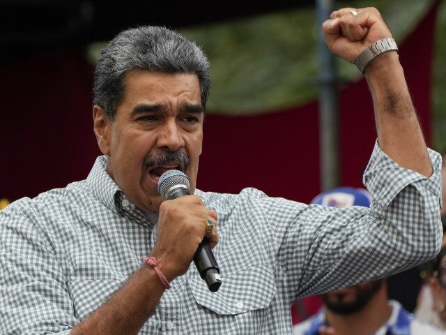 Venezuela's President Nicolas Maduro addresses government loyalists gathered at the p