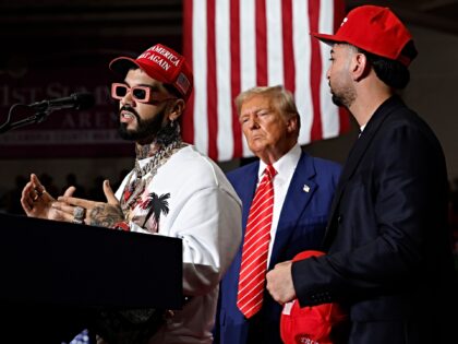 JOHNSTOWN, PENNSYLVANIA - AUGUST 30: Puerto Rican rapper Anuel AA (L) joins Republican pre