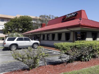 This Jan. 24, 2017, file photo shows a Pizza Hut in Miami. Pizza Hut has reached an agreem