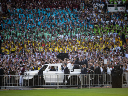 JAKARTA, INDONESIA - SEPTEMBER 05: Pope Francis greets the Indonesian Catholics as he arri