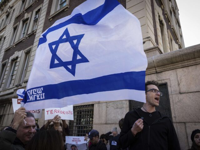 Columbia University assistant professor Shai Davidai reads the names of Israeli hostages h