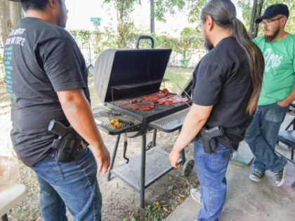 David Blanco (C), 33, an employee of a telecommunications company, and his friend Sergio (