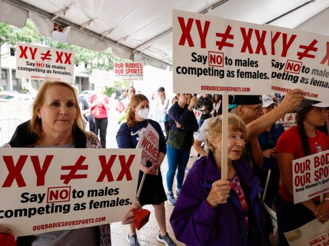 WASHINGTON, DC - JUNE 23: Demonstrators listen to the speaking program during an "Our Bodi