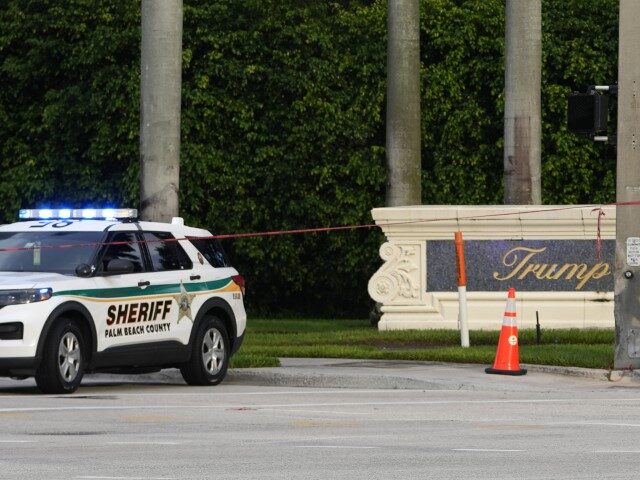 A vehicle with the Palm Beach County Sheriff's office is parked outside of Trump Inte