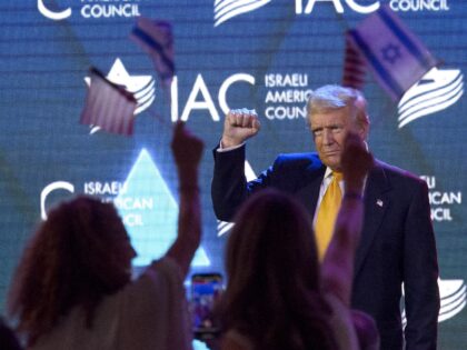 Former President Donald Trump acknowledges the audience as he departs following his remark