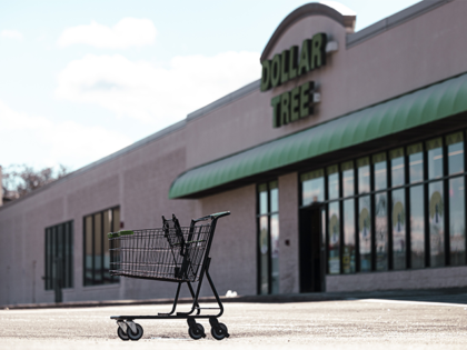 An empty shopping cart outside a Dollar Tree store in Kingston, New York, on February 16,