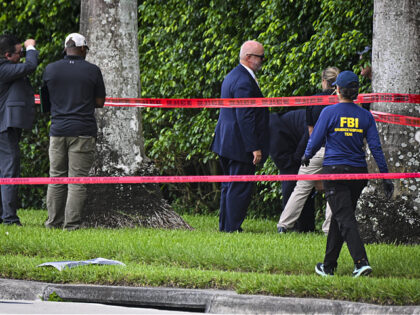 WEST PALM BEACH, FLORIDA - SEPTEMBER 16: Law enforcement personnel investigate the area ar