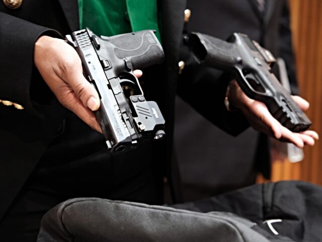 NEW YORK, NEW YORK - MAY 25: Guns confiscated at New York City public schools are displaye