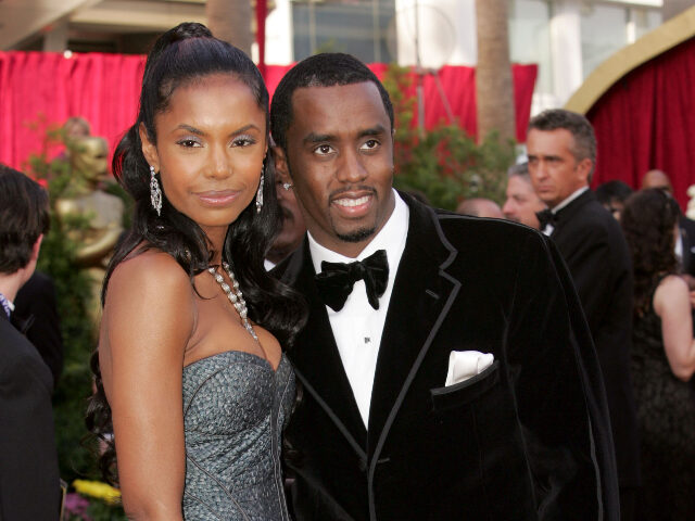 Kim Porter and Sean "P. Diddy" Combs during The 77th Annual Academy Awards - Red