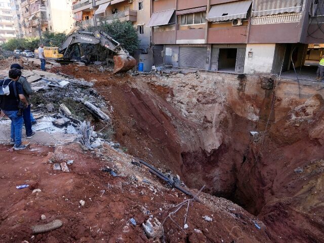 A hole in the ground near the site of the assassination of Hezbollah leader Hassan Nasrall