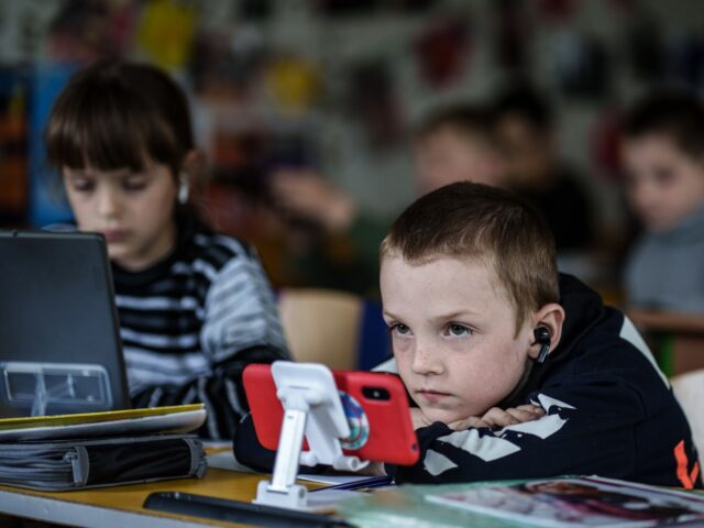 In the village of Drobysheve, Lyman area in Donetsk region, kids gathering in the communit