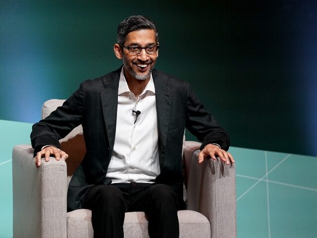 sundar pichai looks gleeful