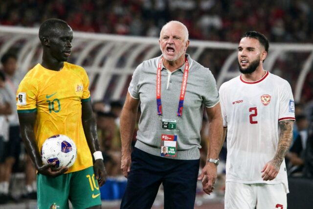 Australia head coach Graham Arnold (C) shows his frustration during the goalless draw agai