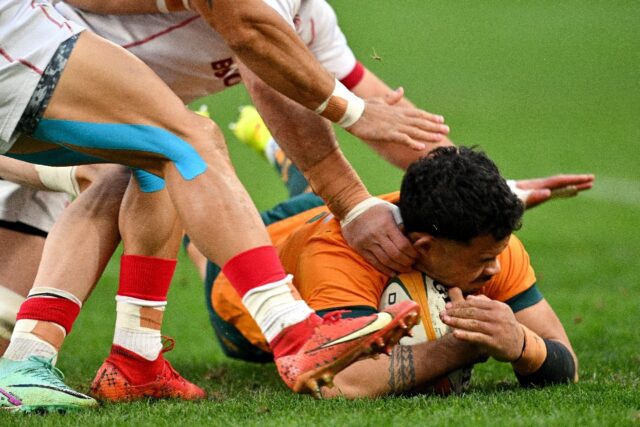 Australia's Hunter Paisami scores a try against Georgia in Sydney in July