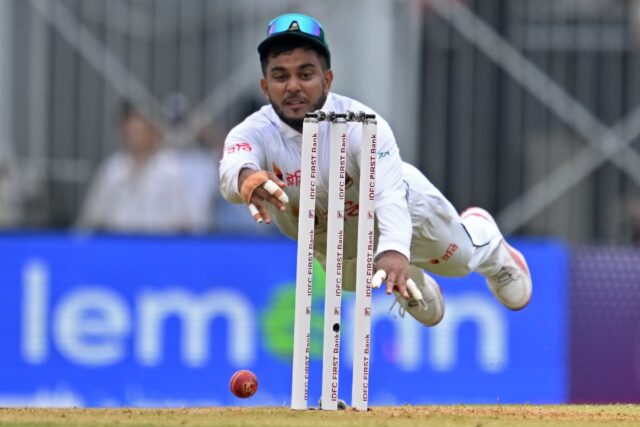 Bangladesh's Zakir Hasan dives during the first day of the first Test cricket match betwee