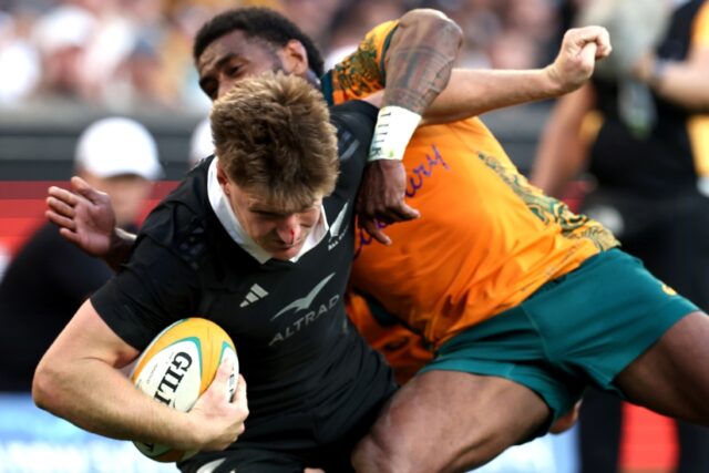 All Blacks centre Jordie Barrett (L) is out of Saturday's second Test against Australia in